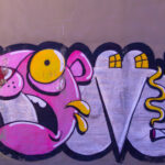 Graffiti artwork of the Pink Panther character in bright colors / Roosa pantri graffitimaal erksates värvides