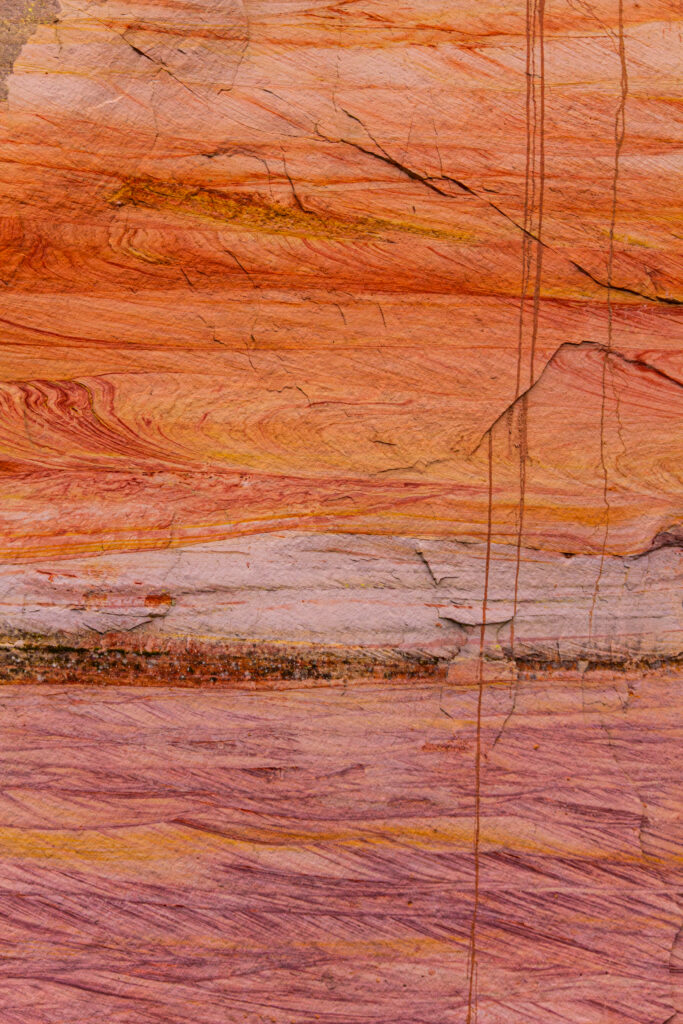 Sandstone cliffs of Suur and Väike Taevaskoda rising above the Ahja River in a lush Estonian forest