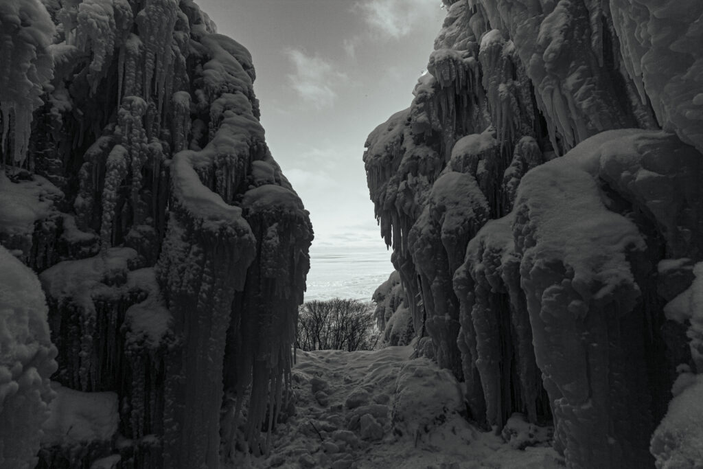 Frozen landscape with icy formations.