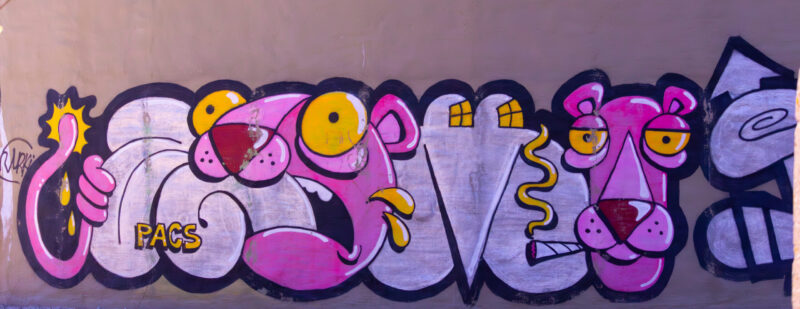 Graffiti artwork of the Pink Panther character in bright colors / Roosa pantri graffitimaal erksates värvides