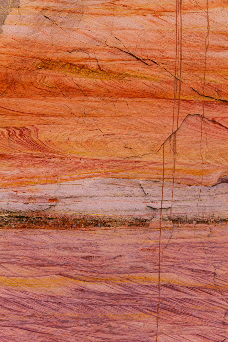 Sandstone cliffs of Suur and Väike Taevaskoda rising above the Ahja River in a lush Estonian forest